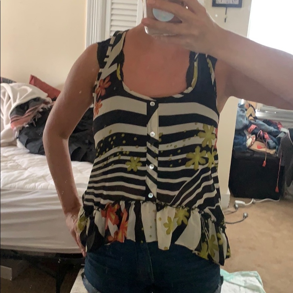 Sheer racer back high low tank ruffle bottom